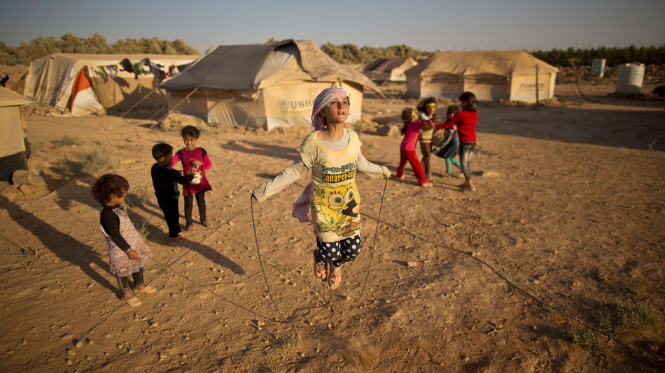 Britain says it will take in 'thousands more' Syrian refugees
